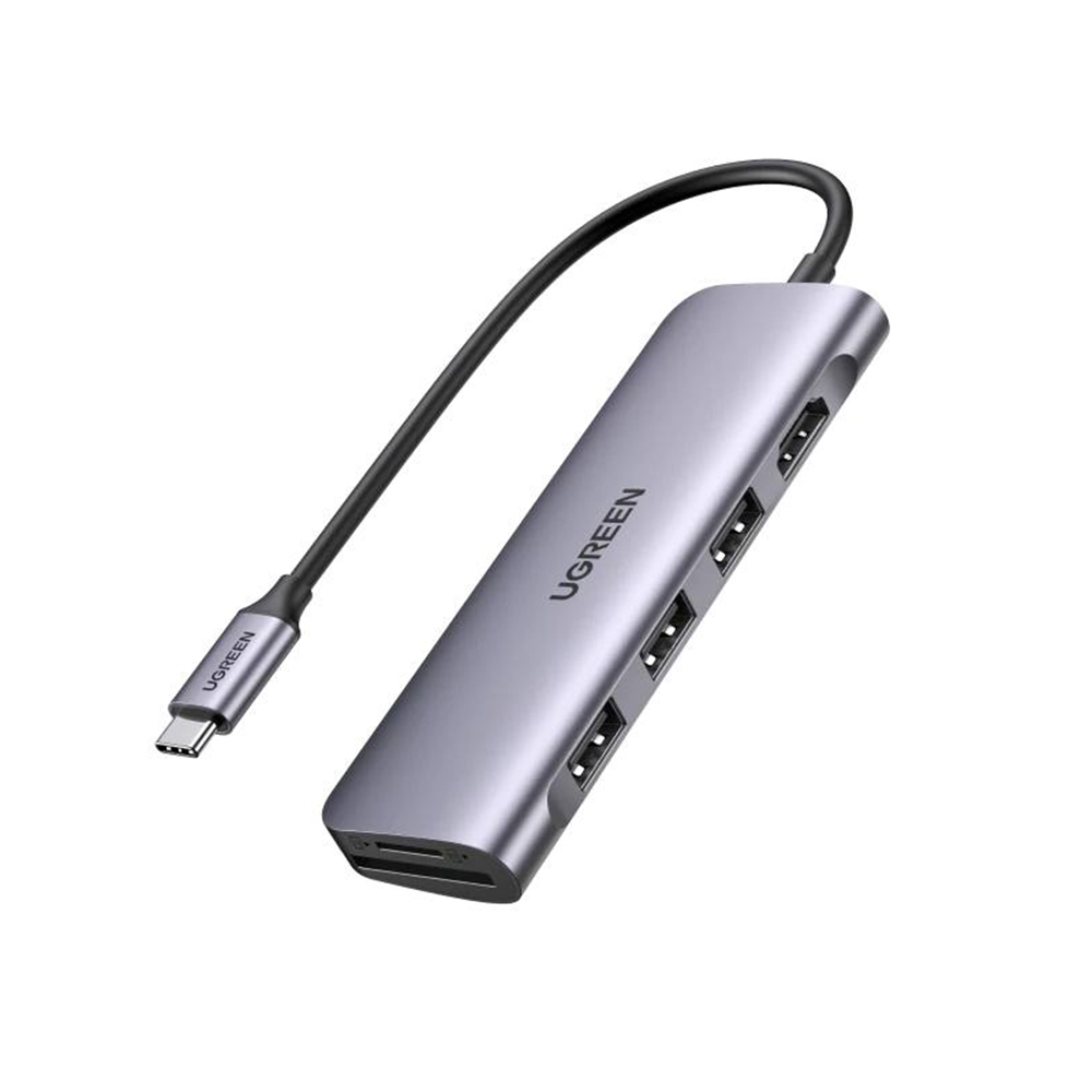 HUB USB C instantáneo 6 en 1 Expanda a más puertos para conectar más. El HUB de datos UGREEN 6-en-1 USB-C cuenta con un puerto de salida HDMI 4K, lectores de tarjetas SD y TF y 3 puertos USB 3.0. Puerto HDMI para fiesta visual 4K UHD Refleje o extienda su pantalla con el puerto HDMI del adaptador UGREEN USB C y transmita directamente video 4K UHD, Full HD 1080p o 3D a HDTV, monitor o proyector. Adaptador de tarjeta SD / TF compacto y eficaz Permite leer 2 tarjetas de memoria simultáneamente a una supervelocidad de 104 MB / S y es ampliamente compatible con las siguientes tarjetas. Transferencia de datos de supervelocidad de 5 Gbps Este concentrador USB tipo C agrega 3 puertos USB 3.0 adicionales para conectar múltiples dispositivos periféricos USB como unidad flash, disco duro, teclado, mouse, impresora, reproductor MP3 y más. El HUB de puertos múltiples podría mantenerlo alejado de los problemas de enchufar y desenchufar repetidamente. Admite transferencias de datos súper rápidas de hasta 5 Gbps, lo que le permite transferir películas o archivos HD en solo segundos. Leer tarjetas SD / TF simultáneamente Las ranuras SD y TF incorporadas acceden fácilmente a archivos desde la tarjeta SD universal y la tarjeta Micro SD; Admite 2 tarjetas que se leen simultáneamente. El lector de tarjetas UGREEN USB C SD transfiere datos con la mayor velocidad hasta 100MB / S, compartiendo todos tus intereses en tu red social libremente. Amplia compatibilidad Mac / iPad USB tipo C Apple MacBook Pro (2019/2018/2017/2016), MacBook (2016/2017/2018), iMac 2019/2017, iMac Pro, MacBook Air 2019/2018, Mac Mini, Nueva MacBook con Thunderbolt 3. Contenido del paquete 1 x Adaptador USB C 6 en 1 con HDMI 4K 1 x manual de usuario 
